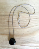 natural black onyx faceted briolette pendant