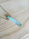 natural chrysoprase "stick" pendant with faceted carnelian accent